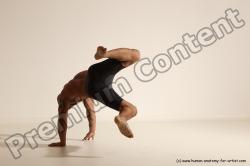 Underwear Gymnastic poses Man Black Muscular Bald Dancing Dynamic poses Academic